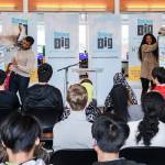 Courtesy photo by Why Not You Foundation                                Russell Wilson and Ciara unveil the limited edition King County System Library cards that feature them and their dreams Friday at the Tukwila Library. The new library cards coincide with the newly launched DREAM BIG: Anything is Possible campaign.