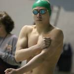 Redmond Highs Aidan Blackmon gets pumped up for the 100 fly. Andy Nystrom / staff photo