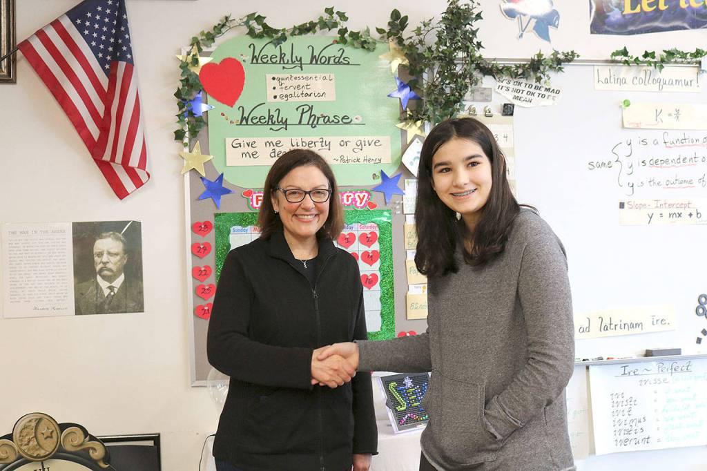 Stella Schola eighth graders had the chance to shake Rep. Suzan DelBenes hand after class on Feb. 20. Stephanie Quiroz/staff photo