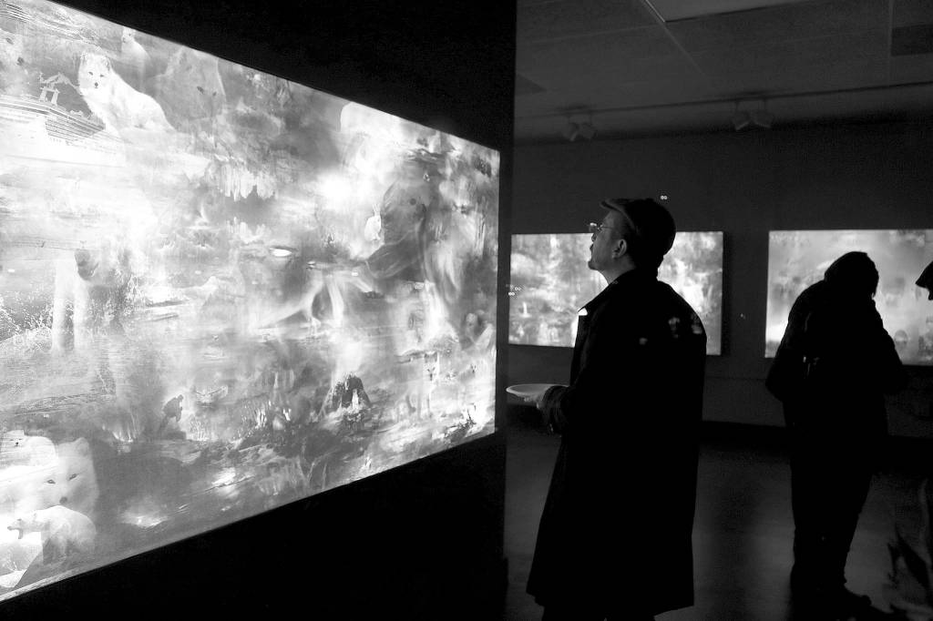 Petrićs piece Skies Epitomize uses artificial intelligence to generate what the sky would look like in the most peaceful and conflicted countries. The installation is exhibited with dynamic lights that subtly changes color just as the sky changes outside. Stephanie Quiroz/staff photo.