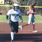 Redmond Highs Haley Hanson screams with joy as she rounds the bases following teammate Jennifer Cummings grand slam. Andy Nystrom / staff photo