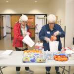 St. Jude Parish members made 125 sack lunches on March 30. Stephanie Quiroz/staff photo
