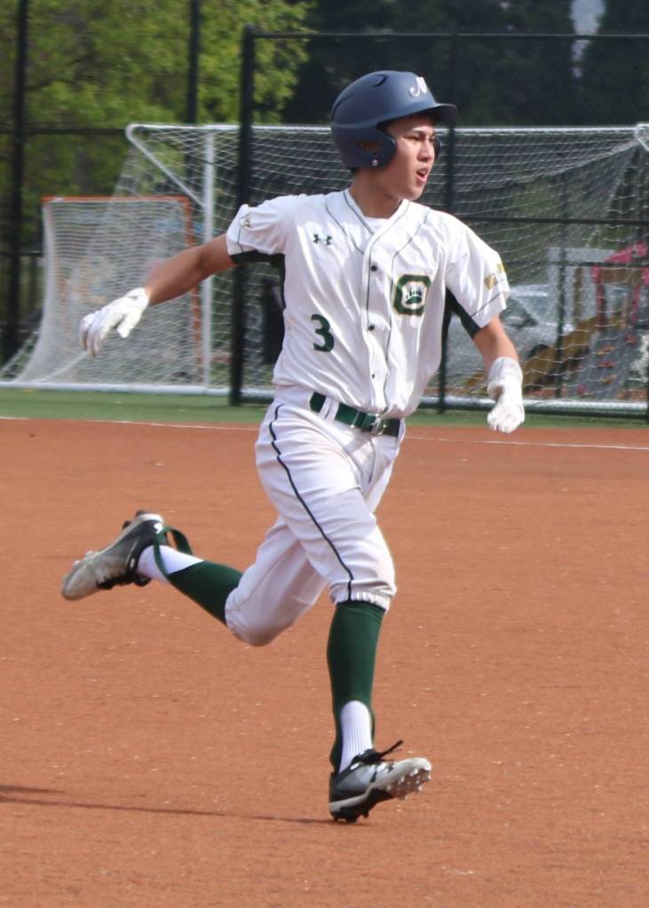 Jay Sivadas heads toward third base. Andy Nystrom / staff photo