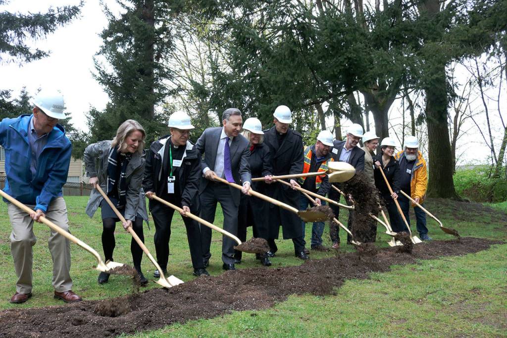 Kailan Manandic/staff photo                                 Officials break ground outside Salt House Church for the Eastsides first permanent women and family shelter. Workers hope to complete construction in 2020.