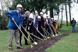 Kailan Manandic/staff photo                                 Officials break ground outside Salt House Church for the Eastsides first permanent women and family shelter. Workers hope to complete construction in 2020.