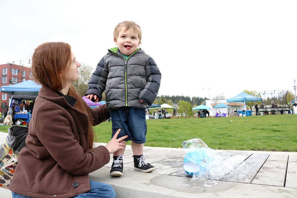 Rebecca and Luke Wildman at the Day Out for Autism event at the Downtown Park in Redmond on April 13. Stephanie Quiroz/staff photo