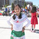 Isabella, 8, from Sammamish wears a traditional Mexican dress at the first Cinco de Mayo festival in Redmond on May 5.