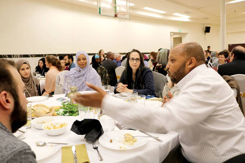 The program included table conversations around the theme, hope Against Hate Hurt. Stephanie Quiroz/staff photo