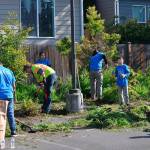 Comcast NBCUniversal employees landscape the Friends of Youth Kirkland campus. Photo courtesy of Comcast NBCUniversal
