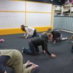 Parents and their children participate in circle time at Joyous Noise.