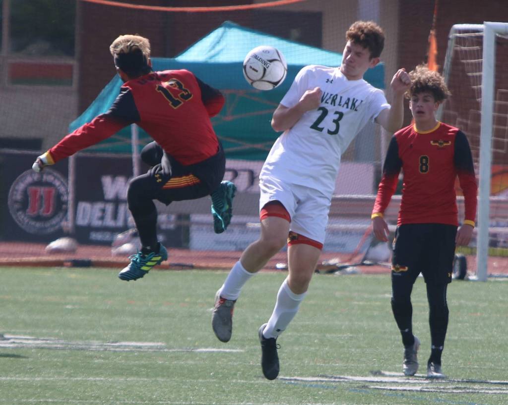 Overlakes Alex Martin goes for the ball in the semifinals. Andy Nystrom/ staff photo