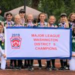 Redmonds Little League majors all-stars softball team notched the District 9 championship. Pictured left to right: Coach John OGara, Avery OGara, manager David Bowman, Amanda Huang (kneeling), Amanda Robarge, Anna Braukus, Sydney Starnes, Paige Boyce, Zoe Aasgaarden, Regan Hendrickson, Brooke Taylor, Vanessa Hepkin, Cate Bowman (kneeling), Anna Huang, Aubrey Bauer and coach Greg Braukus. Courtesy photo