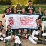 The undefeated age 8/9/10 Redmond softball all-stars defeated Samammish, 6-5, to notch the District 9 championship on July 1 at Centennial Park in Snoqualmie. They are, back row: coach Casey Ruess, manager Chris Dill and coach Wes Barcalow; middle row: Mia Perez, Elle Dill, Julia Cady, Addy Ruess, Ainsley Barcalow and Maggie Enich; bottom row: Kylie Laizans, Simone Loving-Williams, Daisy Walker, Abby Hartman, Livy Ruess, Kati Cygan and Ella Enich. With the game knotted at 5-5 with Redmond batting in the bottom of the sixth, Addy Ruess singled to score Maggie Enich. Addy Ruess knocked four hits and Maggie Enich and Kati Cygan also had multiple hits. Pitcher Mia Perez entered the game in the top of the fifth with runners on; she struck out three batters and allowed only two hits and no runs to hold Samammishs offense at bay. Courtesy photo