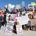 Stephanie Quiroz/staff photos                                 Eastsiders joined the Lights for Liberty: A Vigil to End Human Concentration Camps for a peaceful protest and sign waving at Redmond Downtown Park on July 12.