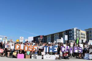 Eastsiders gathered on July 12 for a peaceful protest at Redmond Downtown Park. Protestors held demonstrations that spelled out Close the Camps. Stephanie Quiroz/staff photo