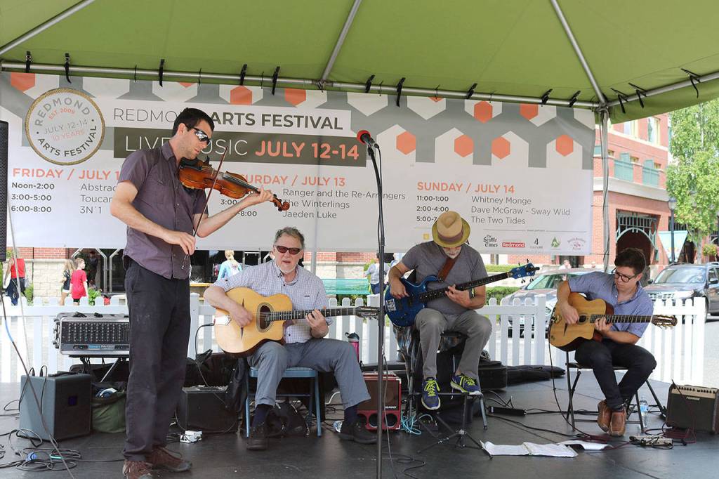Ranger & the Re-Arrangers play a traditional Gypsy melodies at the Arts Festival on July 12. Stephanie Quiroz/staff photo