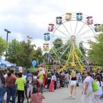 Festival goers enjoy carnival rides and more on July 12. Stephanie Quiroz/staff photo