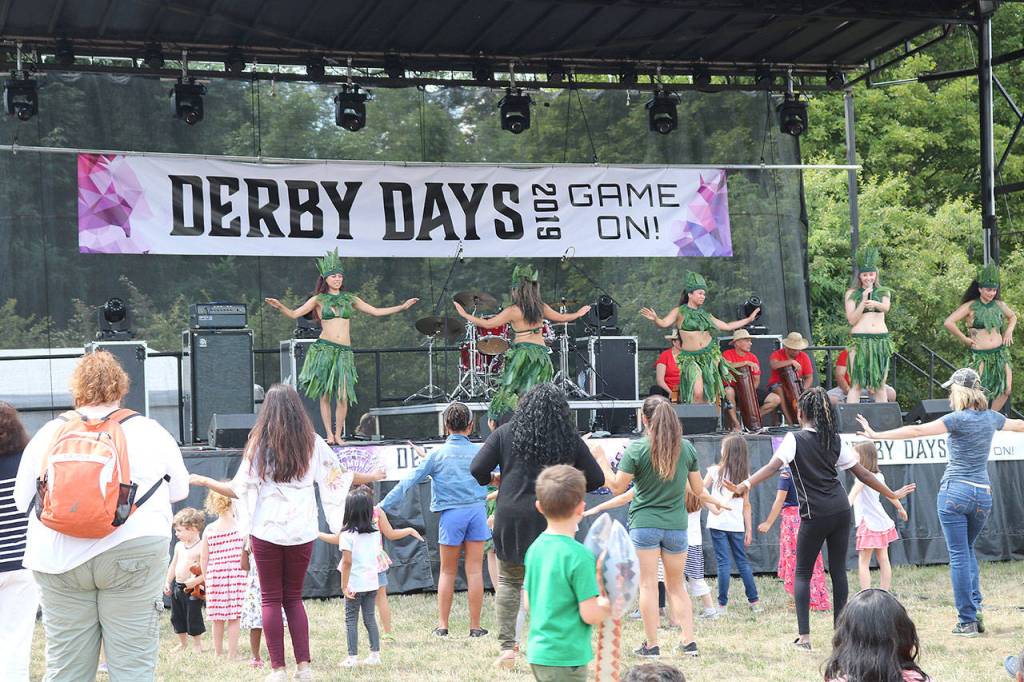 Festival goers at Redmonds Derby Days dance along with hoola dancers on July 12. Stephanie Quiroz/staff photo