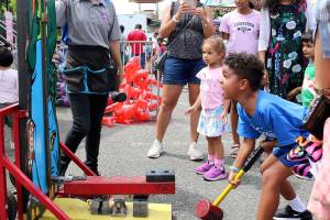 Festival goers at Redmonds Derby Days enjoy carnival games on July 12. Stephanie Quiroz/staff photo