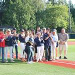 Stephanie Quiroz/staff photo                                 The Dow family standing on the newly named Les Dow field at Hartman Park on July 19.