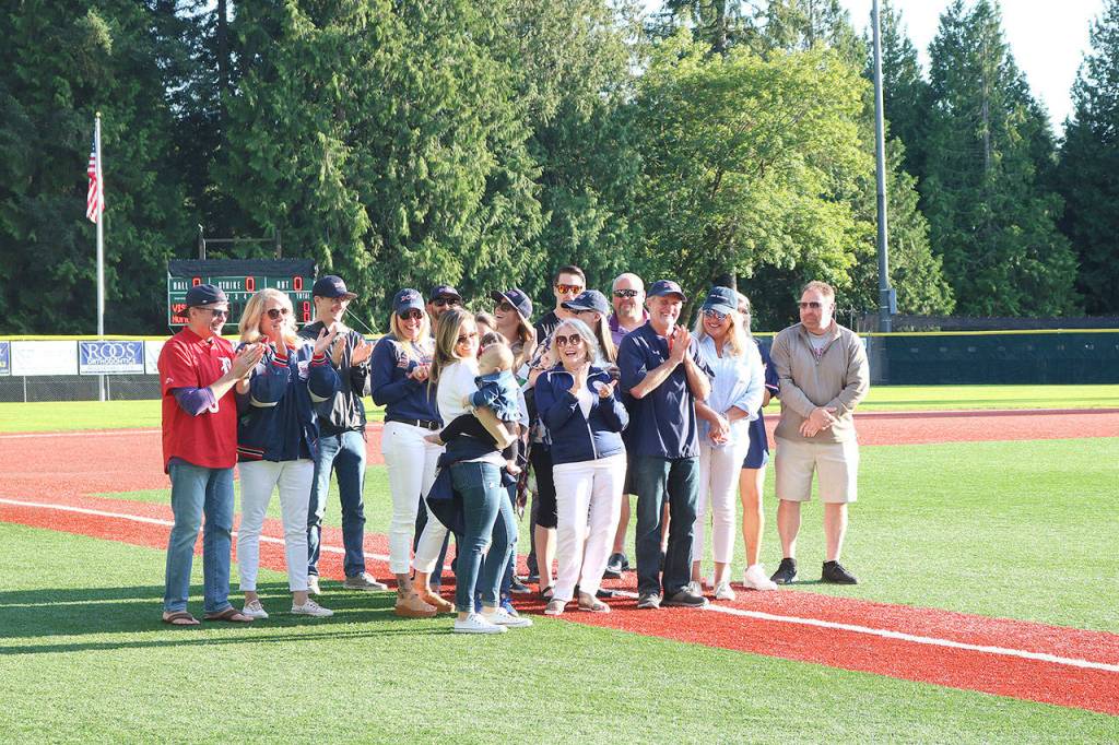 Stephanie Quiroz/staff photo                                 The Dow family standing on the newly named Les Dow field at Hartman Park on July 19.