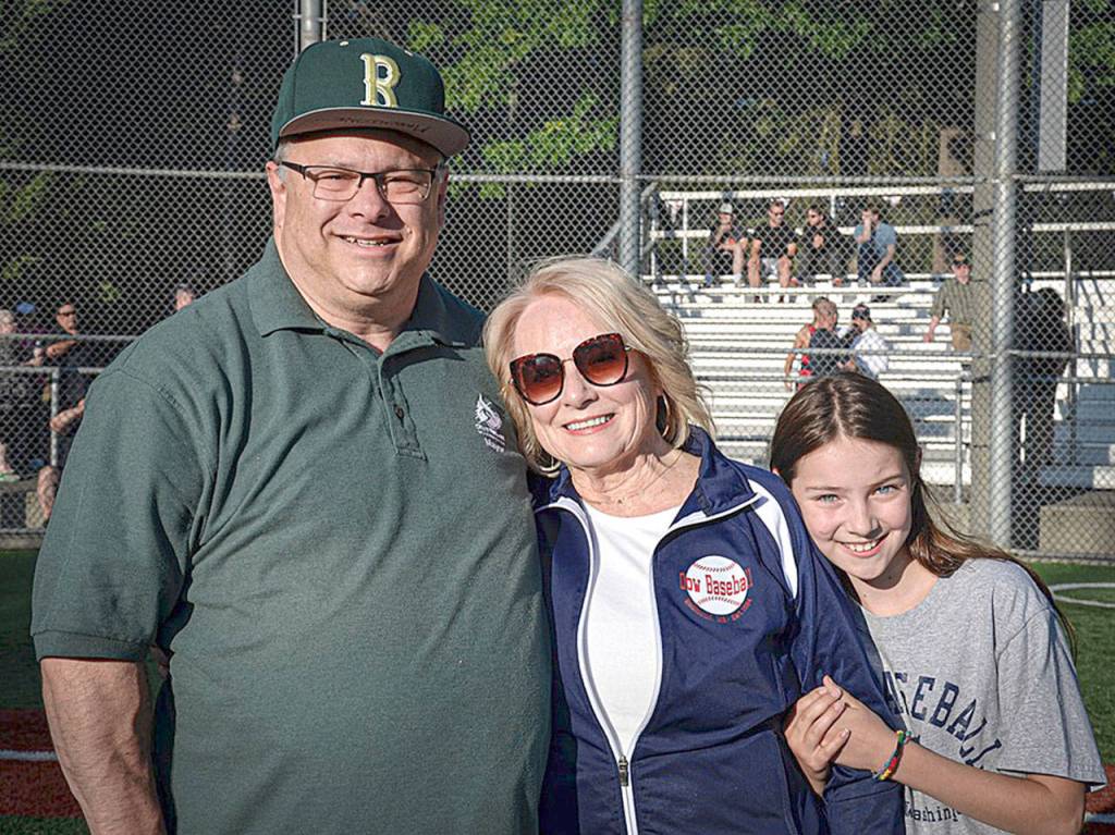 From left, Mayor John Marchione, Erin Dow, and Dani Russell on July 19 at the Les Dow Field Naming Ceremony at Hartman Park. Photo courtesy of the city of Redmond