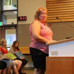 Melody Kieffer, an office manager at Laura Ingalls Wilder Elementary School, addresses the school board on Monday. Madison Miller/staff photo