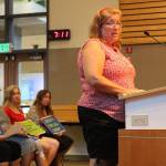 Melody Kieffer, an office manager at Laura Ingalls Wilder Elementary School, addresses the school board on Monday. Madison Miller/staff photo