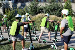 First ride training attendees learn how to properly use a scooter before the group ride around downtown Redmond at the First Ride Training event hosted by Lime and Go Redmond on Aug. 26.Stephanie Quiroz/staff photo