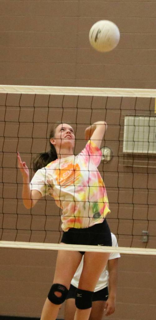 Mia Rice prepares to smash the ball. Andy Nystrom/ staff photo