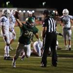 Redmond running back Bryan Aylward celebrates in the end zone after scoring a touchdown in a 24-17 loss to Seattle Prep on Friday, Sept. 13. Photo courtesy of Matt Campbell Photography
