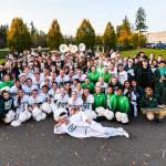 Redmond Highs band and cheerleaders gather before the Mustangs home football game versus North Creek on Oct. 11. North Creek won, 35-20. Photo courtesy of Matt Campbell Photography