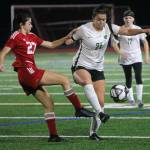Redmonds Izzy Bach-Lefler, right, controls the ball against Newports Ellen Akopyan. Andy Nystrom/ staff photo