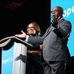 Reaching Out luncheon co-chairs, Lynne Varner and Paul Hollie, introduce Queen Latifah at the Oct. 21 event. Madison Miller/staff photo
