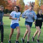Redmond High cross-country runners, from left, Sophia Dahl, Chloe Connolly, Lili Hargreaves and Lauren Lehr train at 60 Acres Park on Monday. Andy Nystrom/ staff photo