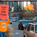 Political activist Tim Eyman rallies support for Initiative 976 on Tuesday afternoon at the corner of NE 8th Street and Bellevue Way NE in Bellevue. Photos by Aaron Kunkler/Sound Publishing