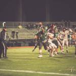 Redmonds Zach Roper scores a touchdown during the Mustangs 49-24 victory over Mercer Island to close out the season on Nov. 8 at home. For the Mustangs, Roper scored twice and Colby Fazio, Tyler Fortney, Carson Bruener, Asres Morris and Matthew Janetzki notched one touchdown apiece. Maroun El-Deek nailed seven PATs. Photo courtesy of Matt Campbell