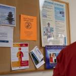 A sign hangs on the bulletin board at the VA medical center for the Ocean Warriors Birthday Party. Curtis hung others, like these, in areas with many eyes to see.
