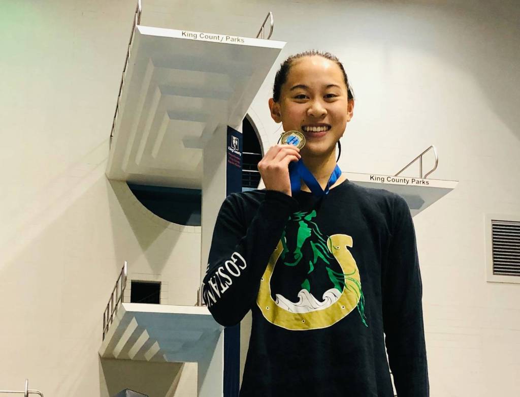 Redmond’s Yu wins 100-yard state breaststroke title