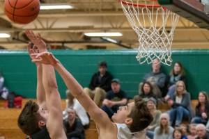 Mustang boys and girls win hoops openers