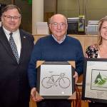 Photo courtesy of city of Redmond Facebook                                From left: John Marchione, Hank Myers and Angela Birney.