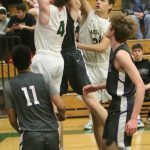Redmond and North Creek players battle for the ball. Andy Nystrom/ staff photo