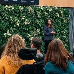 On Jan. 16 in Redmond, Microsoft CFO Amy Hood addresses how the companys new plan for its $1 billion investment will be handled financially. Hood outlines the plans values in working internally and with partners. Photo courtesy of Trisha Hoy