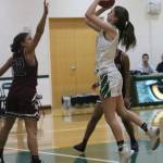 Owl sophomore Addie Sapirstein goes up for a shot against Northwest. Andy Nystrom/ staff photo