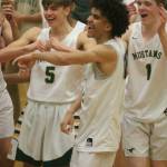 Andy Nystrom/ staff photo                                Redmond High players celebrate their 4A KingCo Crown Division title win over Issaquah on Tuesday.