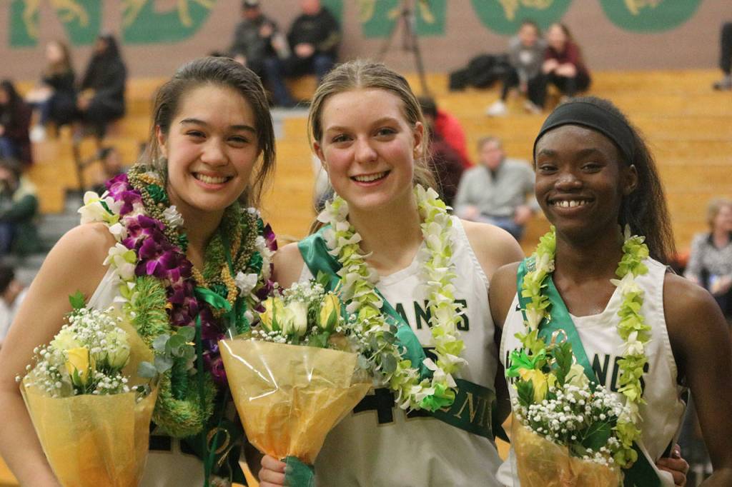 Redmond seniors, from left, Sami Castanos, Whitney Thom and Avery Porcher. Andy Nystrom/ staff photo