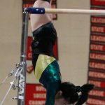 Redmonds Ashley He competes on the bars at a recent gymnastics meet. Courtesy photo