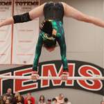 Redmonds Ashley He competes on bars during the individual qualifying meet on Feb. 21 at the state gymnastics meet at Sammamish High School. During event finals on Feb. 22, He competed on vault, finishing 12th. Benjamin Olson/staff photo
