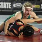 Mustang Molly Williams battles with Othellos Iyazely Barraza in the title match. Andy Nystrom/ staff photo