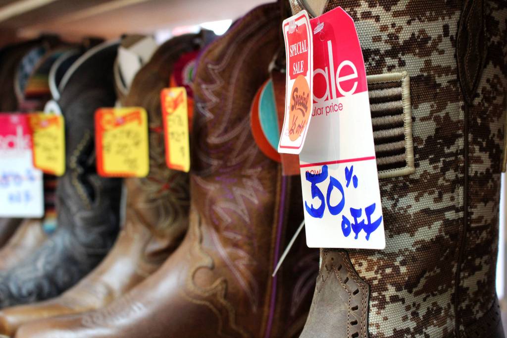 Boots on sale inside Redmond Work and Western Wear in Redmond on March 4. Mitchell Atencio/staff photo